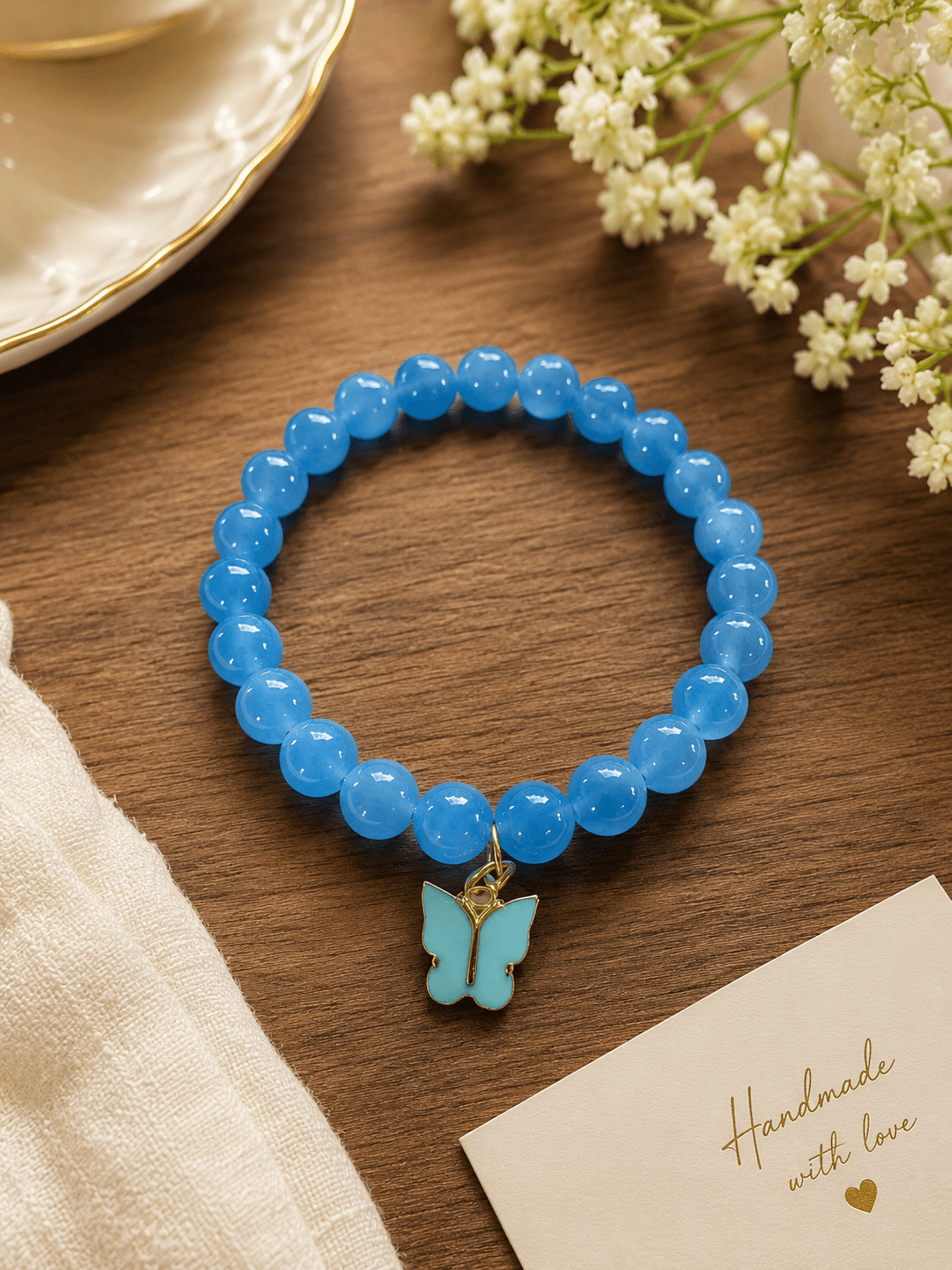 Artisan Blue Jelly Bead & Butterfly Charm Stretch Bracelet | Handmade Jewelry
