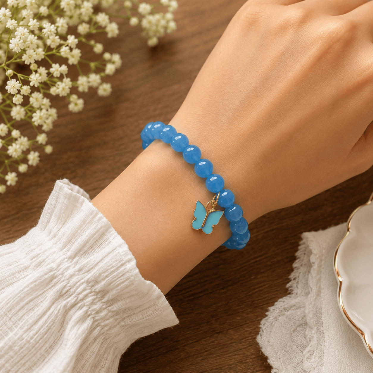 Artisan Blue Jelly Bead & Butterfly Charm Stretch Bracelet | Handmade Jewelry view 2